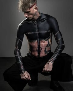 Tattoo blackout MGK